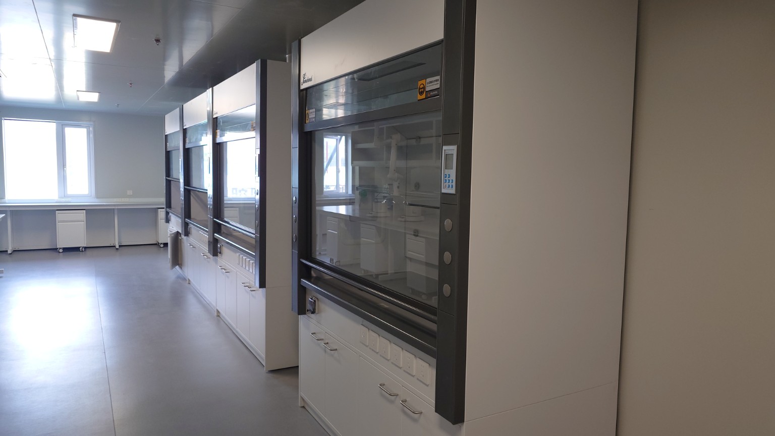 A row of laboratory fume hoods inside the Shunyi dental-device innovation base